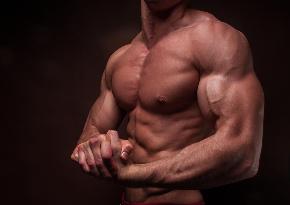Muscular upper body of a ripped man