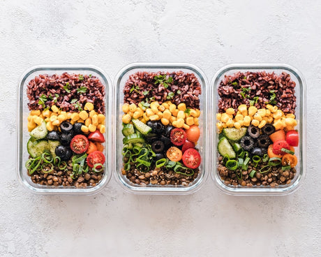 Three containers of healthy meals 