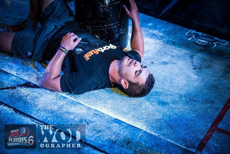 Exhausted athlete lying on the ground