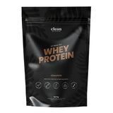 Black packaging of clean nutrition whey protein with chocolate flavor text