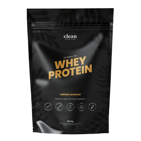Black packaging of clean nutrition whey protein salted caramel flavour with gold text on a white background