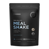 Black package of Tropeaka meal shake cookies and cream flavour on a white background